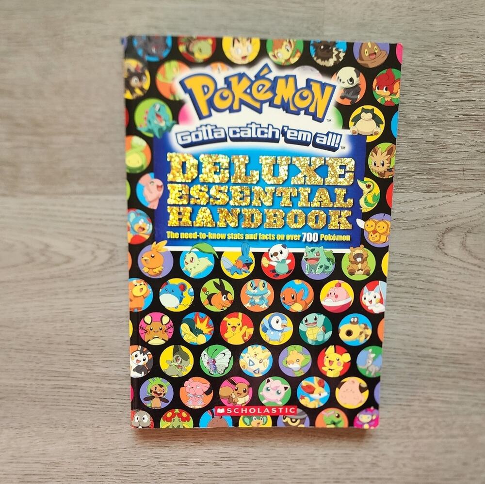 Pokemon Deluxe Essentials Handbook Collector's Guide Scholastic Paperback 2017